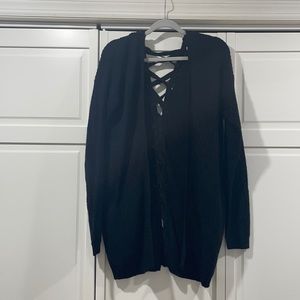 Women’s size L black knit sweater with tie up back detail